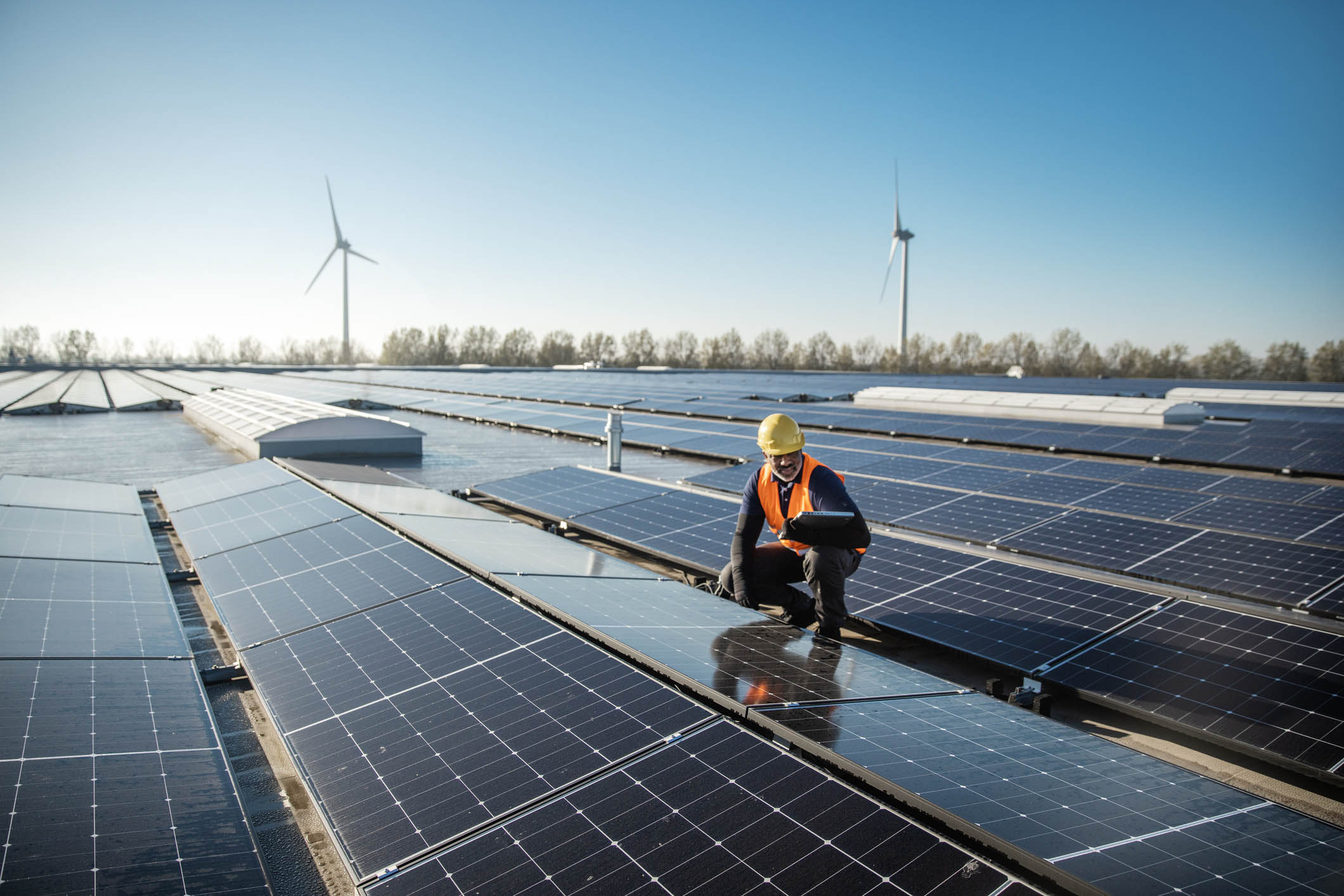 Solar technician working on Solar Panel Stations
