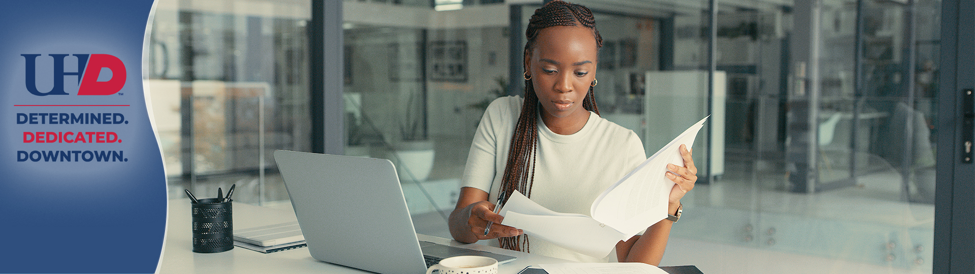 Woman working in an corner office suite