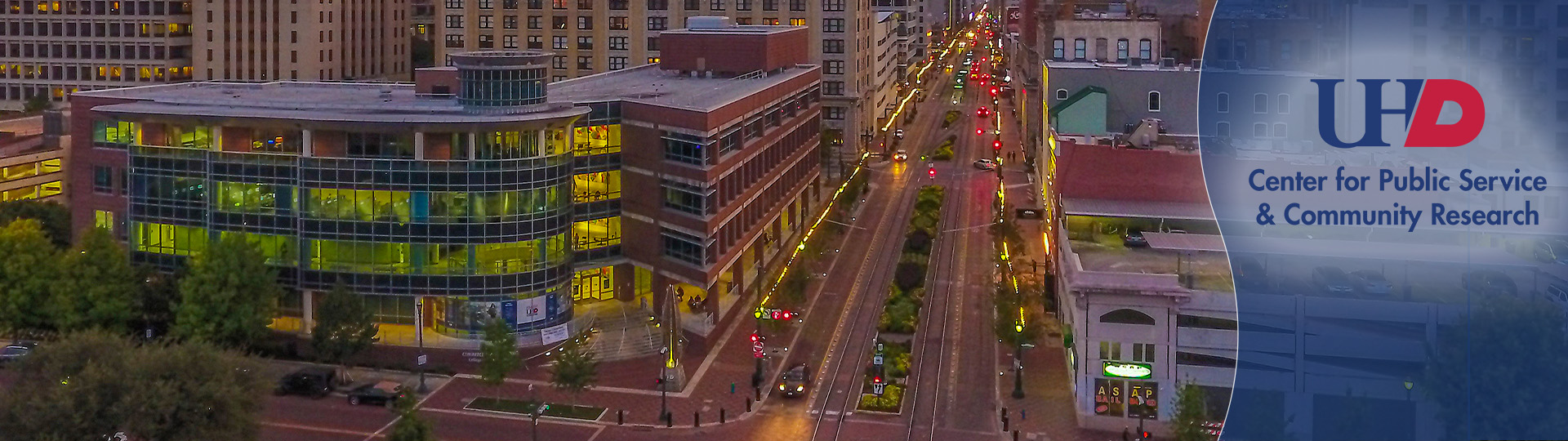 College of Public Service Building with a blue swoosh block on the right with the CPS logo