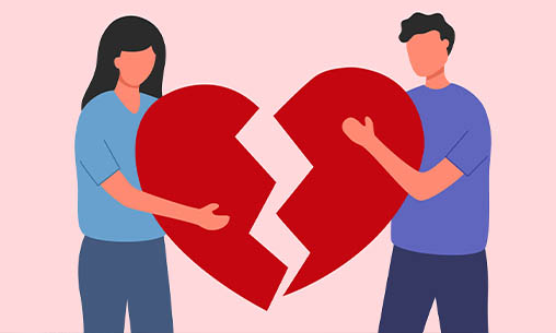 Romantic loss - two people breaking a heart into two pieces