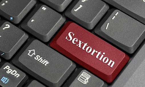 Sextortion on a keyboard key