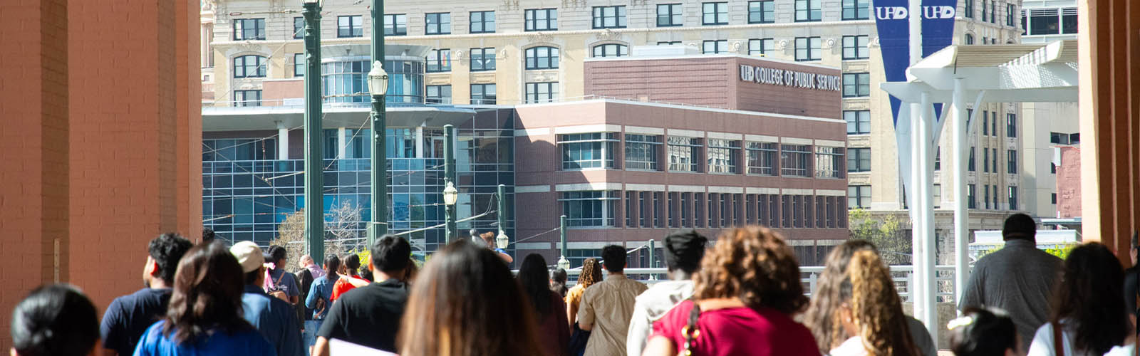 Future student's walking towards UHD Commerce Street Building
