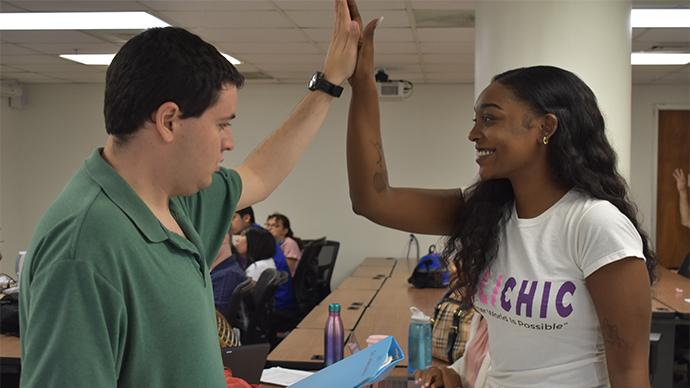 Students High-fiving