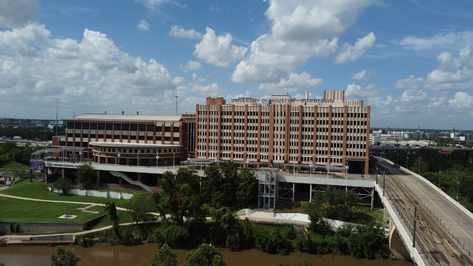 UHD Main and Academic building view from south with Buffalo Bayou and main street