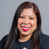 Gladis Moya, university of houston-downtown staff member and alumna, smiles 