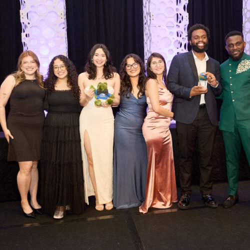 Six members of the digital media team at the marilyn davies college of business at the american marketing association awards ceremony.