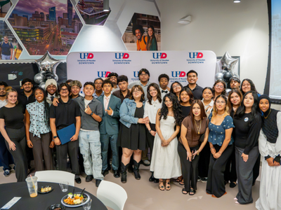 Summer bridge program participants smile at the Get Ready Gators Summer Bridge Program celebration event at the College of Sciences and Technology at the University of Houston-Downtown. 