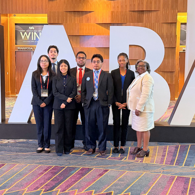 Six University of Houston-Downtown students and members of the university's National Association of Black Accountants with Zoe Smith at the NABA Convention and Expo in Las Vegas Nevada