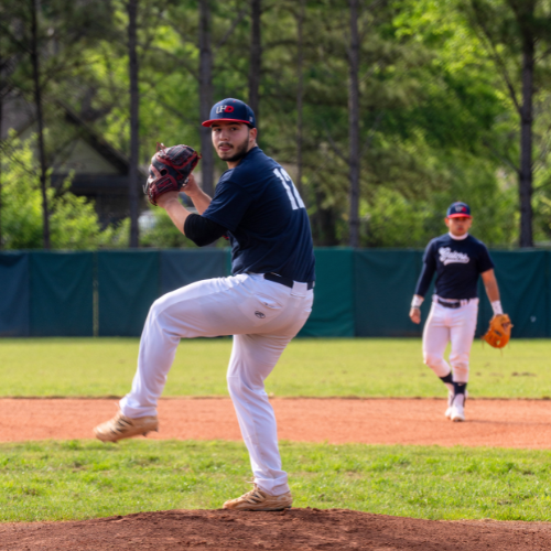 Two University of Houston-Downtown baseball players during a baseball game in Houston, Texas.
