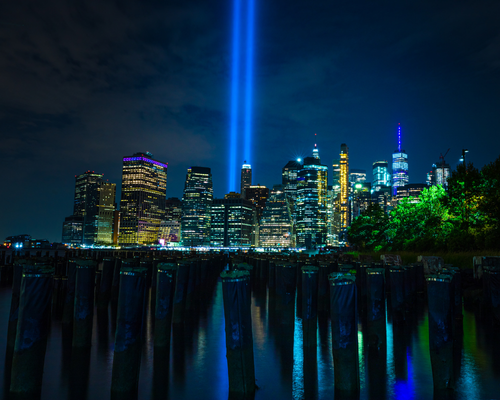 new york city skyline with blue beams of light representing the twin towers in memory of the sept 11 2001 tragedy